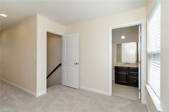 3112 Sybilla St, Chesapeake, VA 23323 - unfurnished bedroom featuring multiple windows, light colored carpet, recessed lighting, and ensuite bath
