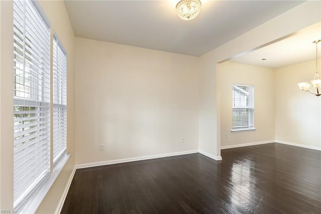 3112 Sybilla St, Chesapeake, VA 23323 - unfurnished room featuring a chandelier and dark wood-style flooring