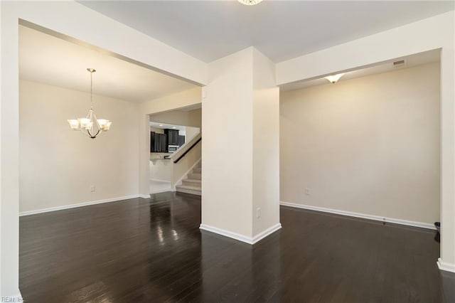 3112 Sybilla St, Chesapeake, VA 23323 - empty room with a chandelier, wood finished floors, and stairs