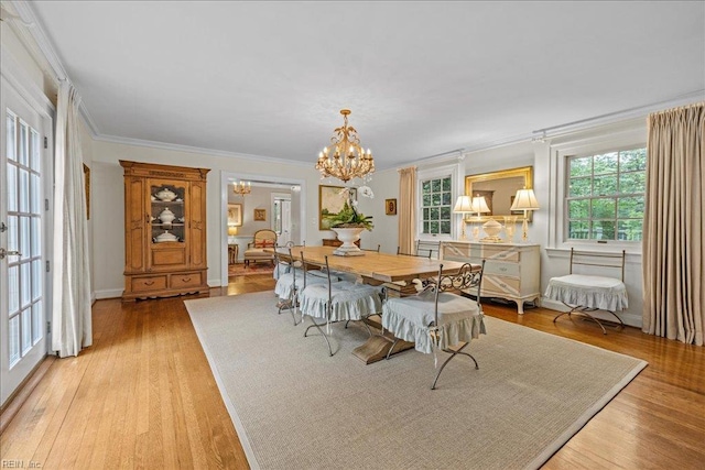 537 Cavalier Dr, Virginia Beach, VA 23451 - dining room with a chandelier, light wood-type flooring, and ornamental molding