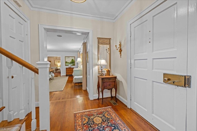 537 Cavalier Dr, Virginia Beach, VA 23451 - entrance foyer featuring wood finished floors, crown molding, and stairway