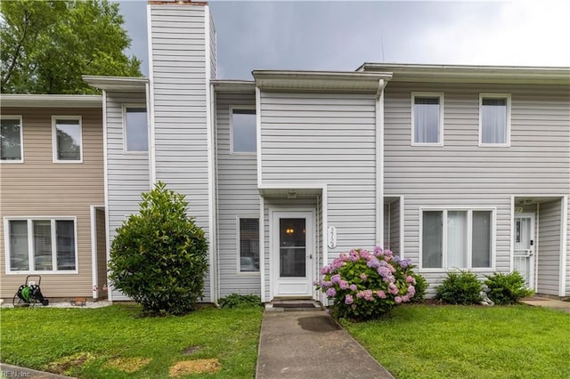 3724 Radford Cir, Chesapeake, VA 23321 - view of front of home with a chimney and a front yard
