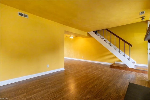 3724 Radford Cir, Chesapeake, VA 23321 - unfurnished living room featuring wood finished floors, a ceiling fan, and stairs