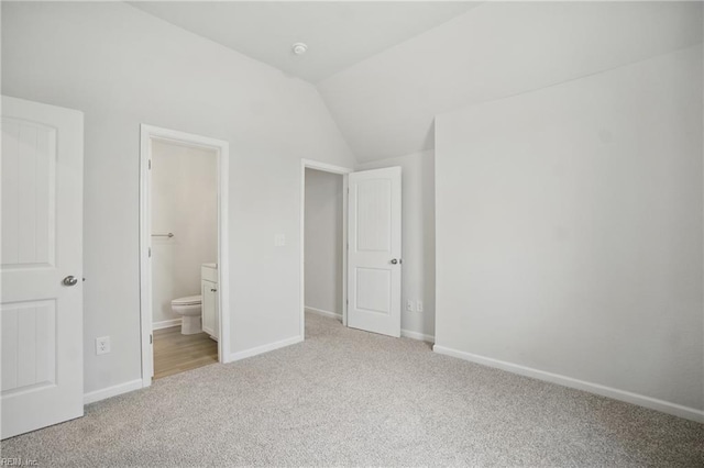453 Asuza St, Chesapeake, VA 23323 - unfurnished bedroom with carpet flooring, vaulted ceiling, and ensuite bathroom