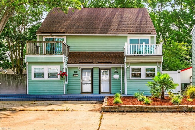 1509 Cypress Ave, Virginia Beach, VA 23451 - view of front facade featuring a balcony, a porch, and roof with shingles