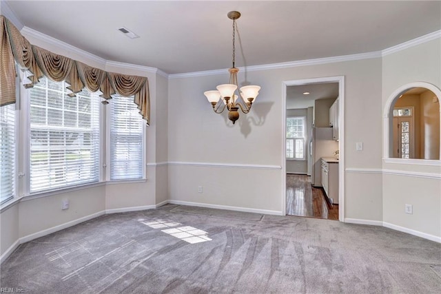 6667 Rexford Ln, Williamsburg, VA 23188 - empty room featuring a chandelier, carpet flooring, and crown molding