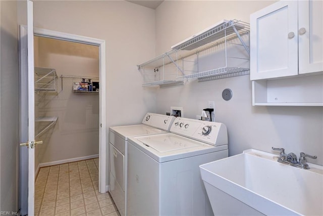 6667 Rexford Ln, Williamsburg, VA 23188 - laundry area featuring washer and dryer and cabinet space