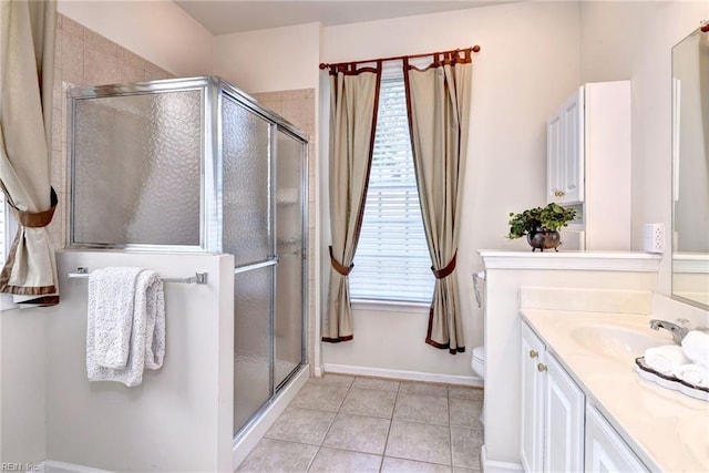 6667 Rexford Ln, Williamsburg, VA 23188 - full bathroom with vanity, a shower stall, and tile patterned floors