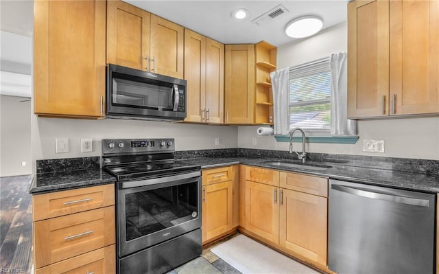 2504 Pine Needles Cir, Virginia Beach, VA 23453 - kitchen with appliances with stainless steel finishes, dark stone countertops, recessed lighting, light wood-type flooring, and open shelves