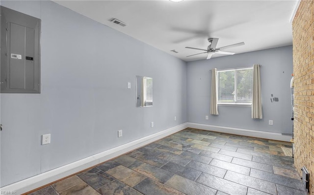 2504 Pine Needles Cir, Virginia Beach, VA 23453 - empty room featuring electric panel, a ceiling fan, and stone finish floors