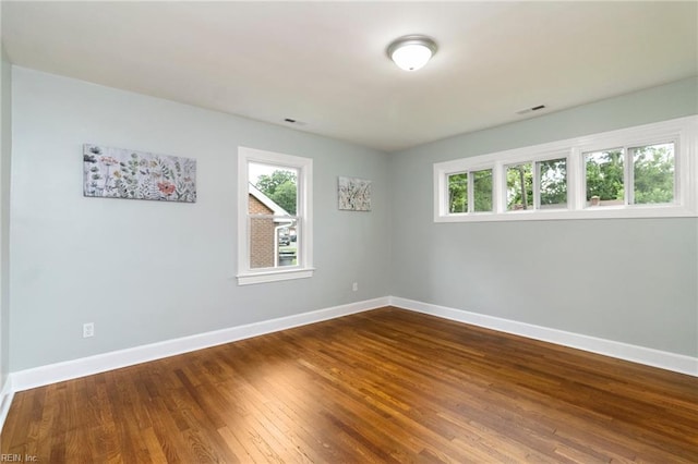 1 N Greenfield Ave, Hampton, VA 23666 - spare room with baseboards and dark wood finished floors