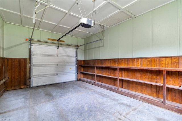 1 N Greenfield Ave, Hampton, VA 23666 - garage featuring a garage door opener and a decorative wall