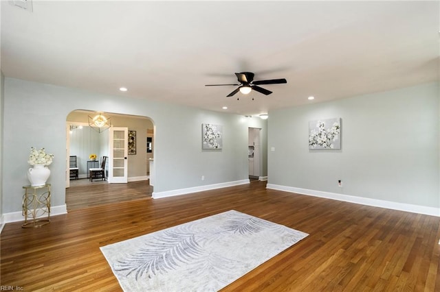 1 N Greenfield Ave, Hampton, VA 23666 - unfurnished living room featuring arched walkways, ceiling fan, wood finished floors, and recessed lighting