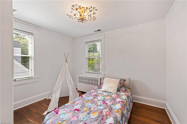 112 Fayton Ave, Norfolk, VA 23505 - bedroom featuring radiator heating unit, wood finished floors, and ornamental molding