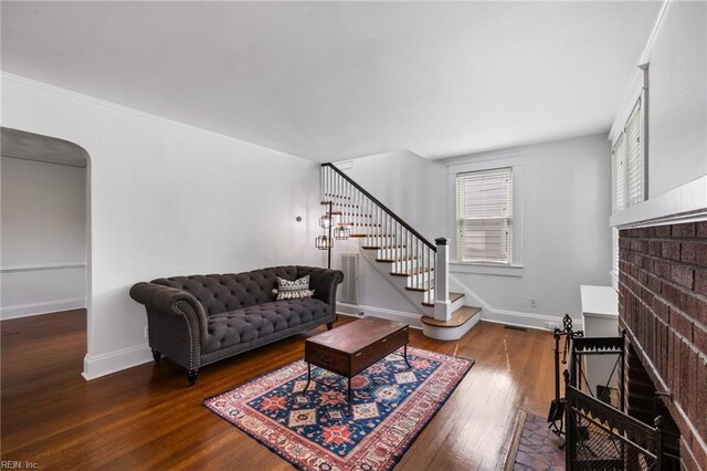 112 Fayton Ave, Norfolk, VA 23505 - living area featuring stairs, hardwood / wood-style floors, and arched walkways