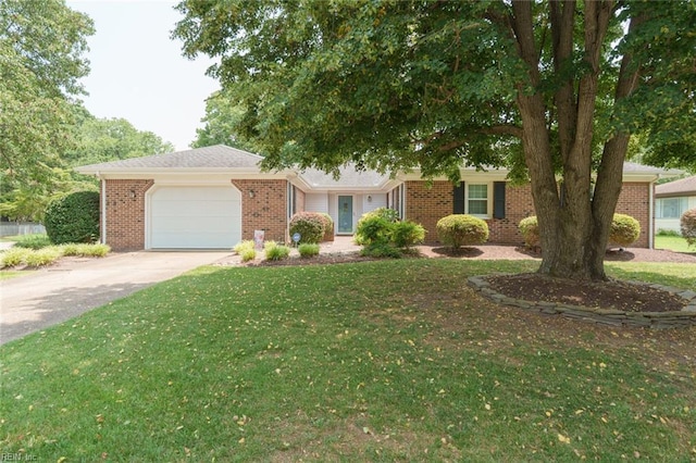 1328 Burlington Rd, Virginia Beach, VA 23464 - view of front of house featuring an attached garage, brick siding, concrete driveway, and a front yard