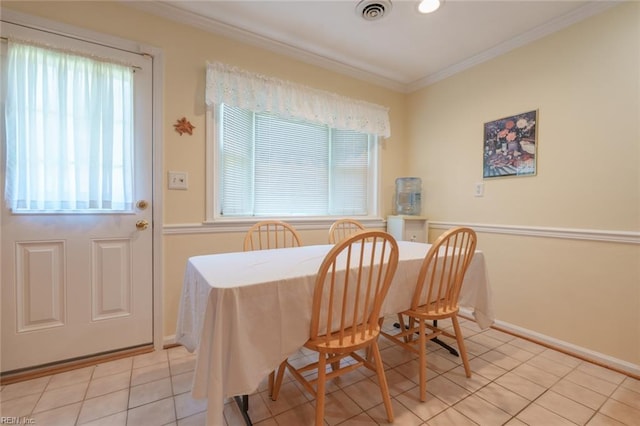 1328 Burlington Rd, Virginia Beach, VA 23464 - dining space with healthy amount of natural light, light tile patterned floors, and crown molding