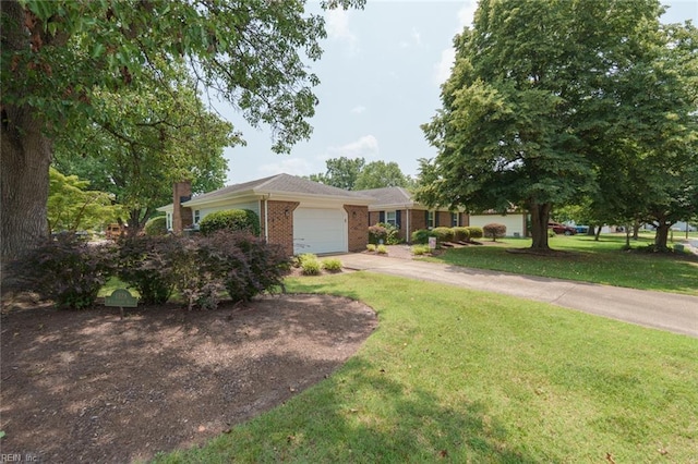 1328 Burlington Rd, Virginia Beach, VA 23464 - ranch-style house with brick siding, a garage, concrete driveway, and a front yard