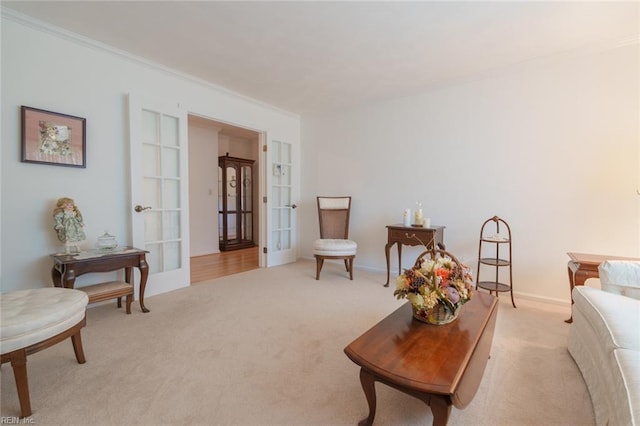 1328 Burlington Rd, Virginia Beach, VA 23464 - living room featuring light colored carpet, ornamental molding, and french doors