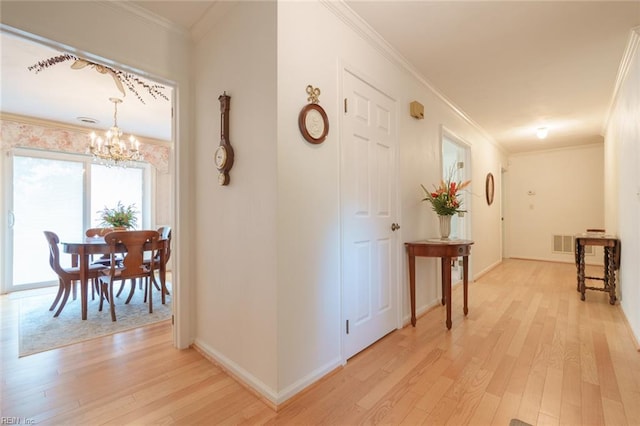 1328 Burlington Rd, Virginia Beach, VA 23464 - hallway with light wood-style floors, a chandelier, and ornamental molding