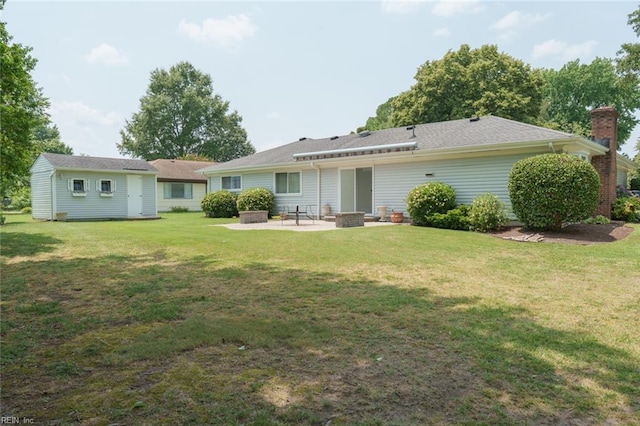 1328 Burlington Rd, Virginia Beach, VA 23464 - back of property with a patio, a lawn, and a chimney