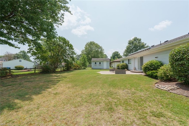 1328 Burlington Rd, Virginia Beach, VA 23464 - view of yard featuring an outdoor structure and a patio