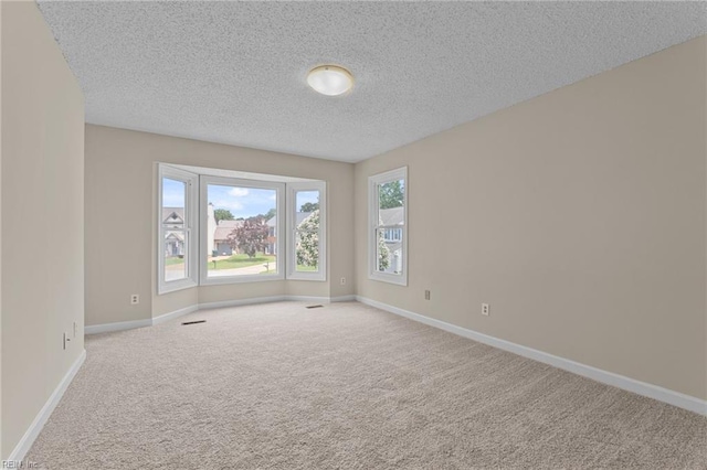 890 Brompton Ct, Newport News, VA 23608 - unfurnished room with carpet floors and a textured ceiling