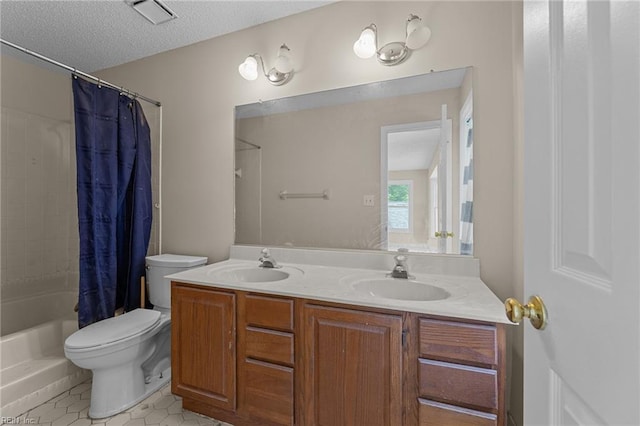 890 Brompton Ct, Newport News, VA 23608 - full bath with double vanity, shower / tub combo, tile patterned floors, and a textured ceiling