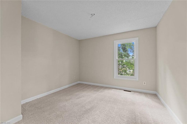 890 Brompton Ct, Newport News, VA 23608 - unfurnished room with carpet flooring and a textured ceiling
