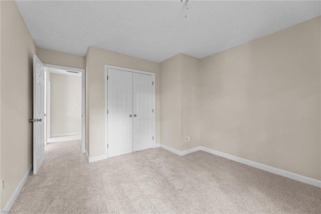 890 Brompton Ct, Newport News, VA 23608 - unfurnished bedroom featuring carpet and a closet