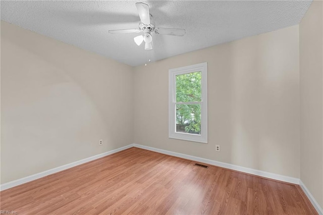 890 Brompton Ct, Newport News, VA 23608 - unfurnished room with wood finished floors, a textured ceiling, and a ceiling fan