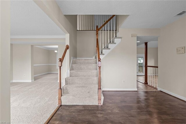 890 Brompton Ct, Newport News, VA 23608 - stairs featuring a textured ceiling and wood finished floors