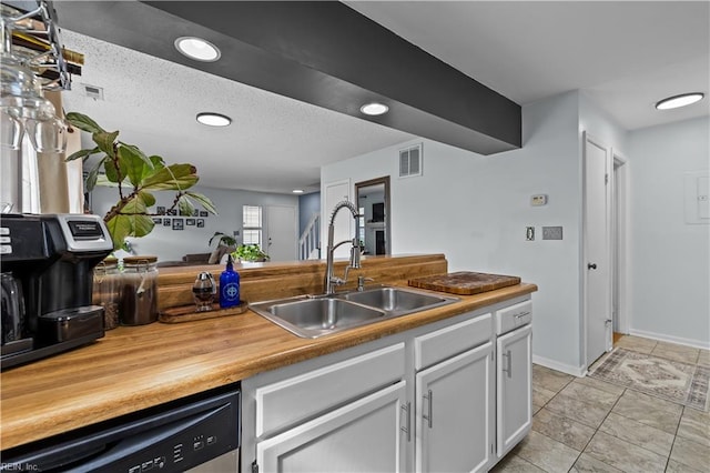 4592 Genoa Cir, Virginia Beach, VA 23462 - kitchen featuring wood counters, stainless steel dishwasher, white cabinetry, recessed lighting, and light tile patterned flooring