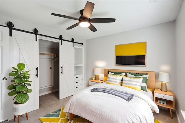 809 Maitland Dr, Virginia Beach, VA 23454 - carpeted bedroom with a barn door, ceiling fan, and a closet