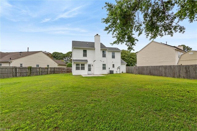 809 Maitland Dr, Virginia Beach, VA 23454 - rear view of property featuring a patio area, a fenced backyard, and a chimney