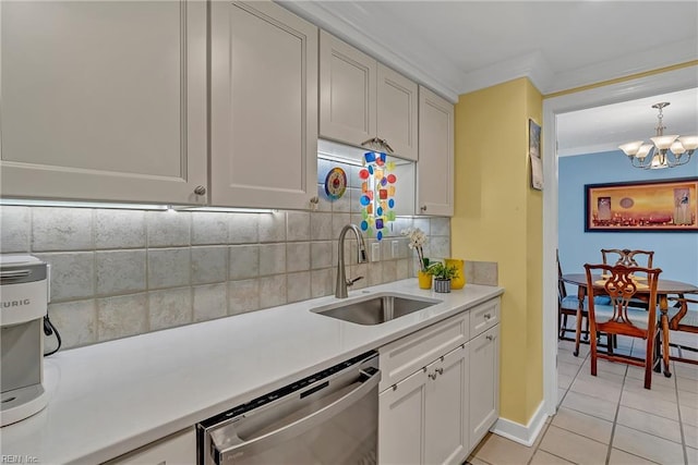 4004 Atlantic Ave Unit 309, Virginia Beach, VA 23451 - kitchen with dishwasher, a chandelier, backsplash, light countertops, and light tile patterned flooring