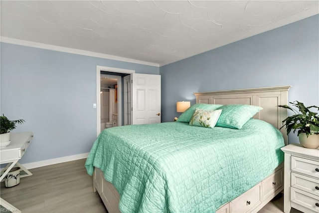 4004 Atlantic Ave Unit 309, Virginia Beach, VA 23451 - bedroom featuring light wood finished floors and crown molding