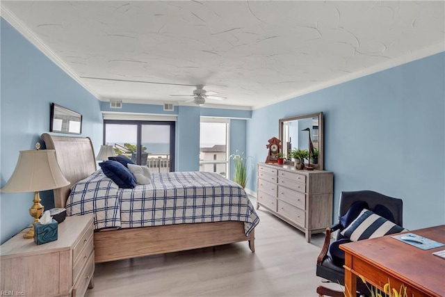 4004 Atlantic Ave Unit 309, Virginia Beach, VA 23451 - bedroom with ornamental molding and light wood finished floors