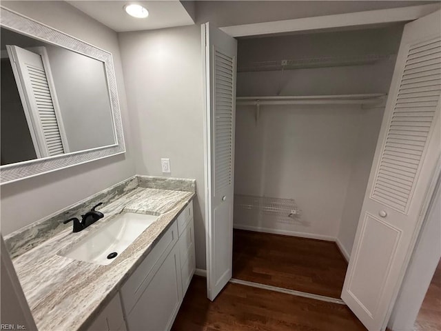 613 Presidential Blvd, Virginia Beach, VA 23452 - bathroom with a closet, wood finished floors, and vanity