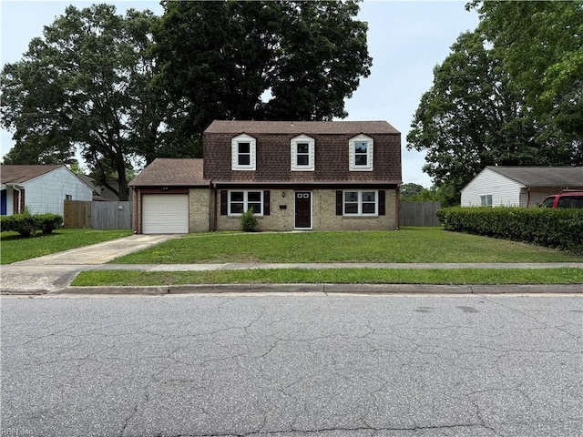 613 Presidential Blvd, Virginia Beach, VA 23452 - colonial inspired home featuring driveway, an attached garage, roof with shingles, and brick siding