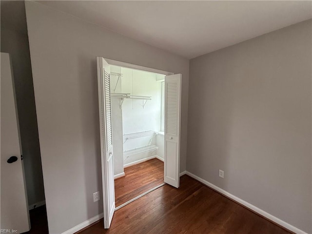 613 Presidential Blvd, Virginia Beach, VA 23452 - unfurnished bedroom featuring dark wood-type flooring and a closet