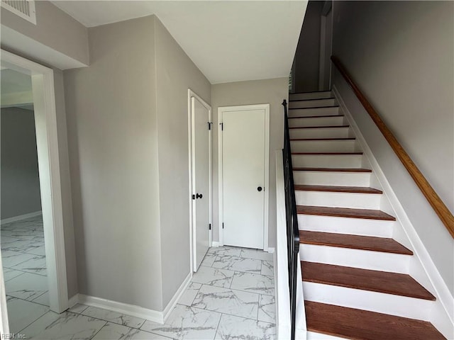613 Presidential Blvd, Virginia Beach, VA 23452 - stairs featuring marble look tile flooring and baseboards