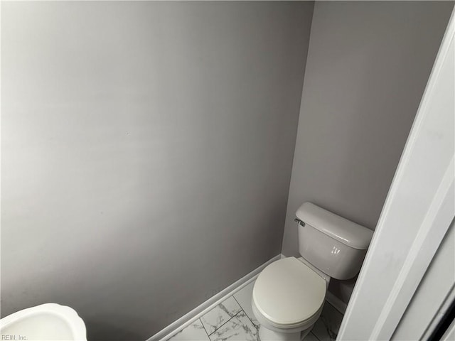 613 Presidential Blvd, Virginia Beach, VA 23452 - bathroom featuring toilet and marble look tile flooring