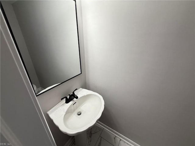 613 Presidential Blvd, Virginia Beach, VA 23452 - bathroom featuring marble look tile flooring and a sink