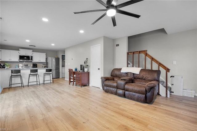3440 Marabou Ln, Virginia Beach, VA 23451 - living area with ceiling fan, recessed lighting, light wood finished floors, and stairway