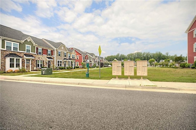 4321 Sconce, Williamsburg, VA 23188 - surrounding community featuring mail area, a residential view, and a lawn