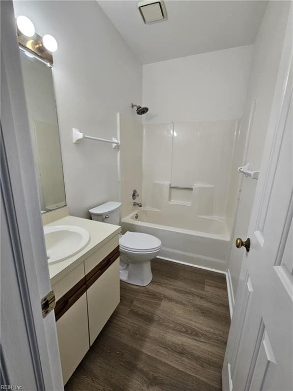 495 E Lake Cir, Chesapeake, VA 23322 - full bathroom featuring wood finished floors, vanity, and  shower combination