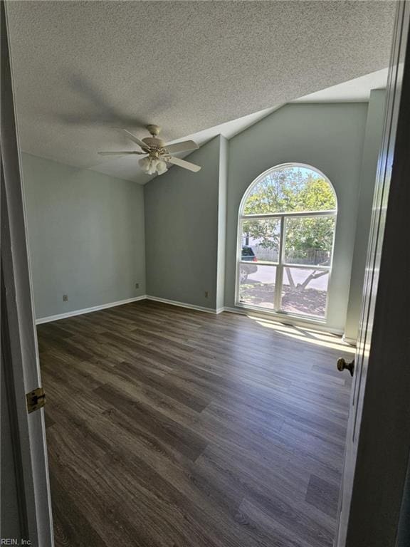 495 E Lake Cir, Chesapeake, VA 23322 - empty room featuring a textured ceiling, dark wood-type flooring, and a ceiling fan