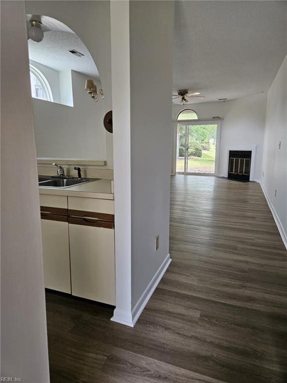 495 E Lake Cir, Chesapeake, VA 23322 - corridor with dark wood finished floors and arched walkways