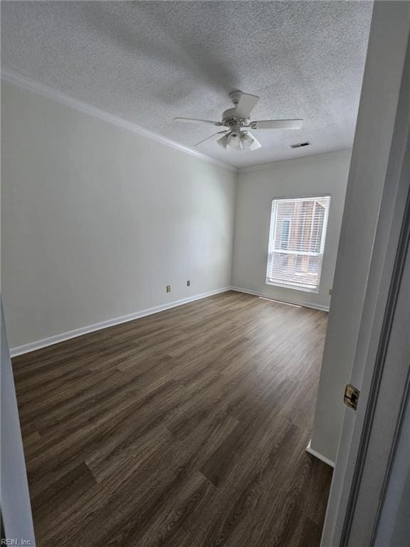 495 E Lake Cir, Chesapeake, VA 23322 - empty room with dark wood-style floors, ceiling fan, a textured ceiling, and crown molding